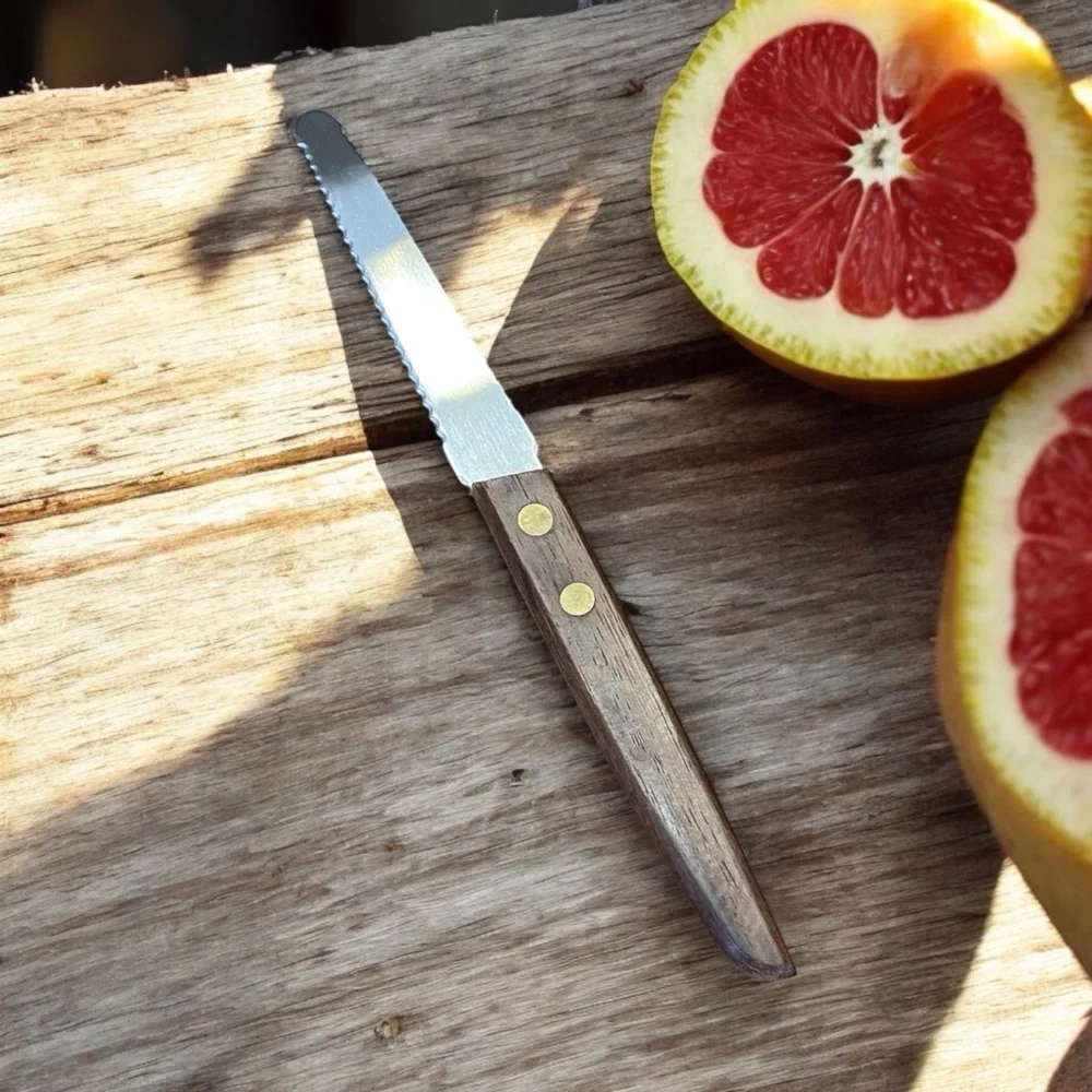 Vintage Geneva Forge stainless steel grapefruit knife.